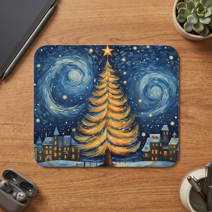 Mousepad with a starry night Christmas scene featuring a glowing tree and village.