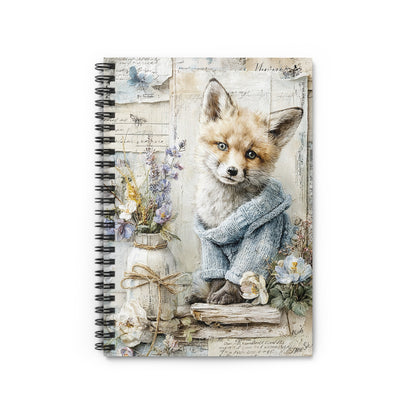 Notebook with a watercolor-style fox wearing a blue sweater and wildflowers.