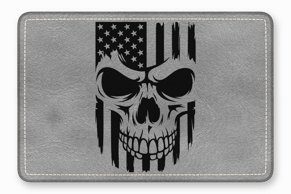 A grey leather patch features a distressed black skull graphic overlaid with the American flag.