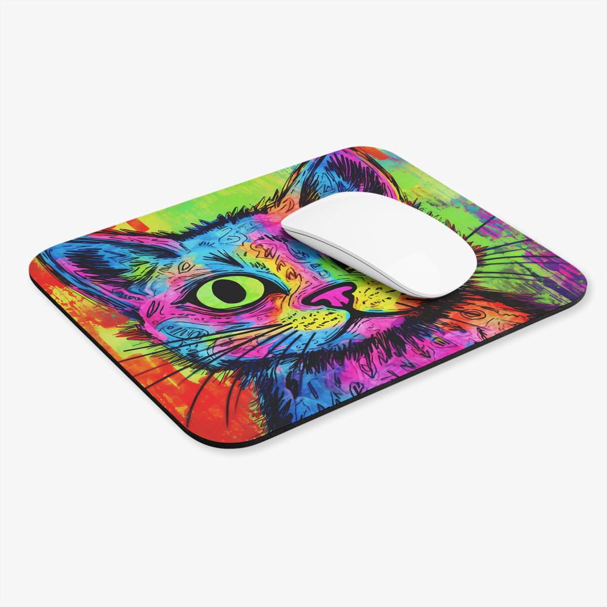 A rectangular mousepad featuring a vibrant, colorful abstract cat illustration with a white wireless mouse resting on top.