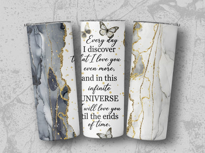 Three tumblers with marble and gold accents, one with text about love.