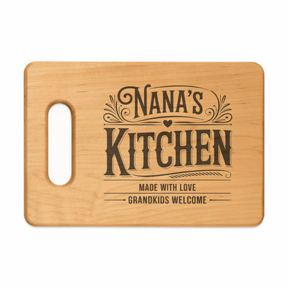 Wooden cutting board with "Nana's Kitchen Made With Love Grandkids Welcome" text.