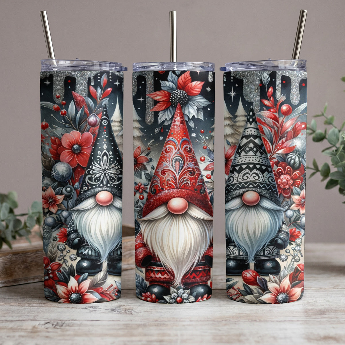 Three tumblers feature Christmas gnomes with red and white flowers.
