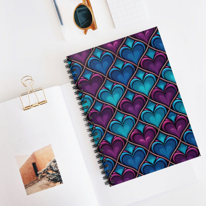 Spiral notebook with a stained glass heart pattern in purple and blue.