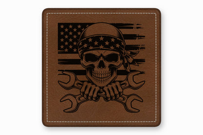 Brown faux leather patch featuring an engraved skull in a bandana with crossed wrenches and an American flag.