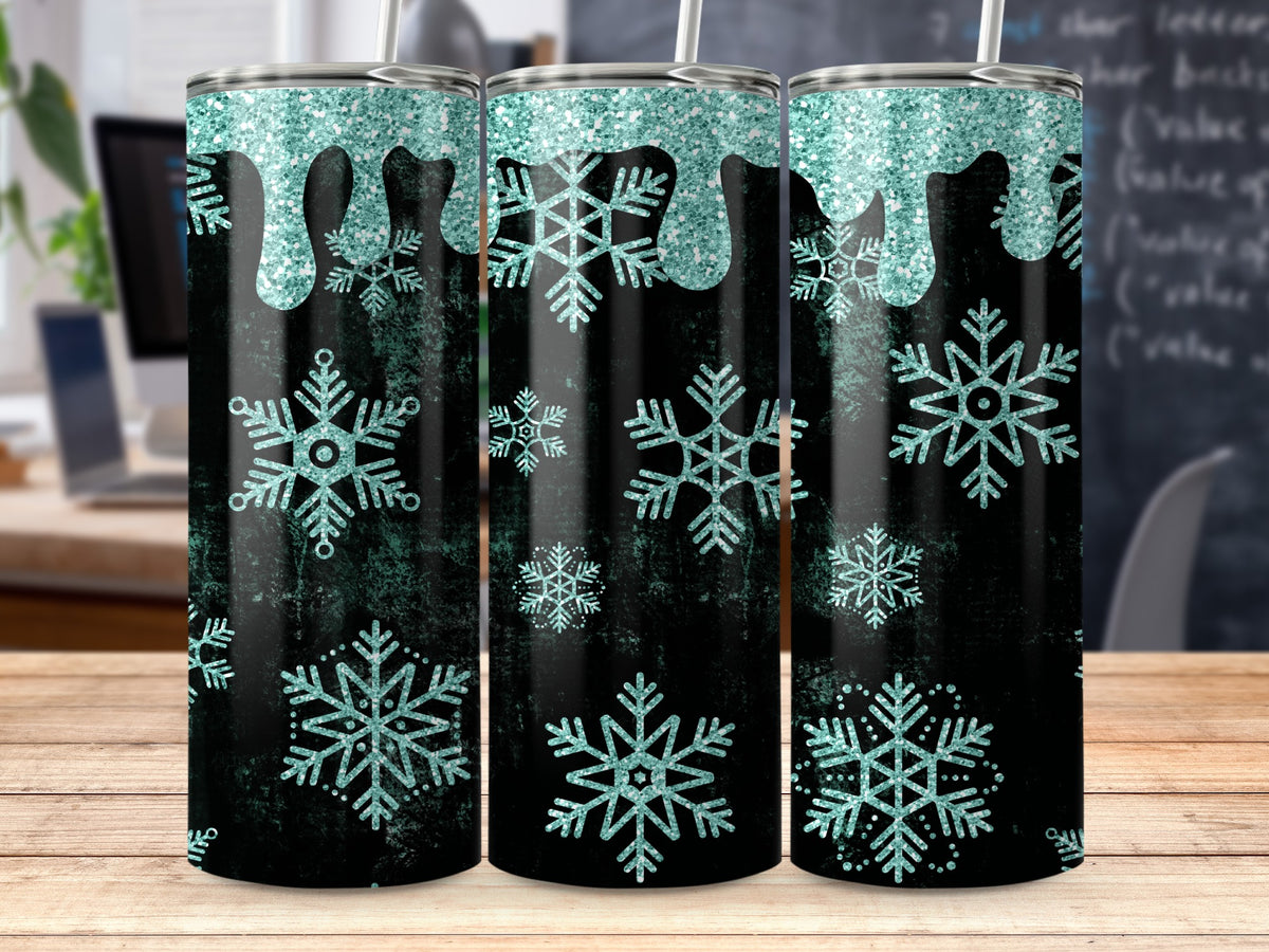 Black tumbler with teal glitter drips and snowflakes.