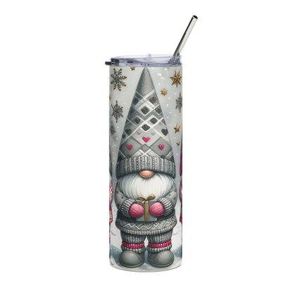Gnome holding gift on a tumbler with snowflakes and stars pattern.