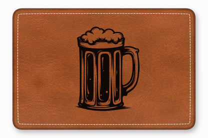 Brown leather patch featuring a black etched illustration of a frothy beer mug.