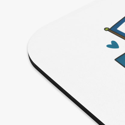 White mousepad with blue heart and corner of a blue and brown graphic.
