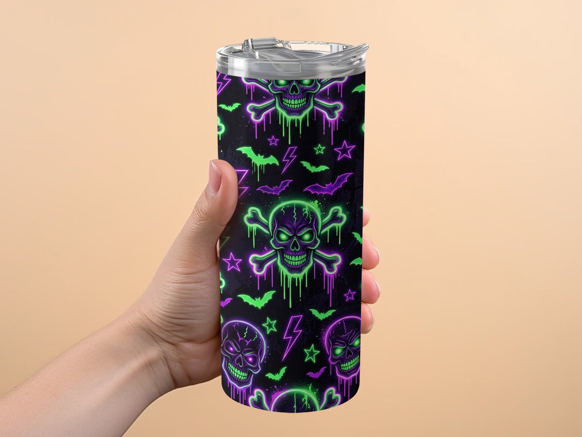 Tumbler with neon green and purple skull and crossbones pattern.