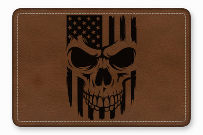 Brown leather patch with rounded corners featuring a black engraved skull and American flag design.