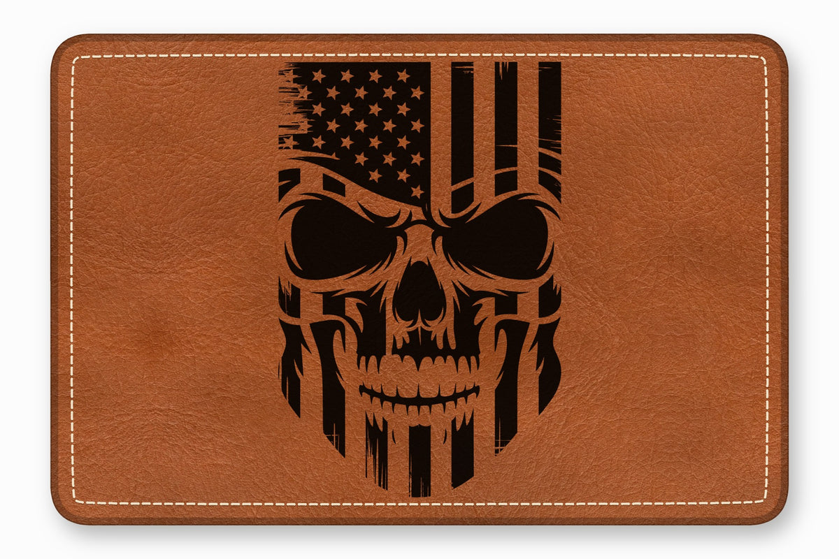 Brown leather rectangular patch with white stitched border and a distressed American flag skull graphic.