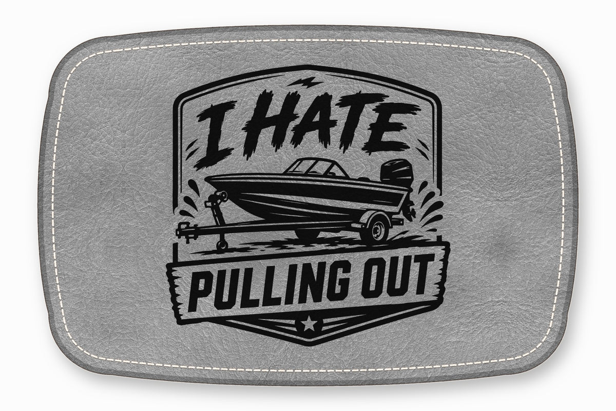 Gray faux leather patch featuring a black boat trailer graphic and the text I HATE PULLING OUT.