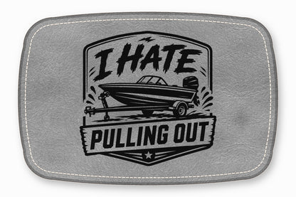 Gray faux leather patch featuring a black boat trailer graphic and the text I HATE PULLING OUT.