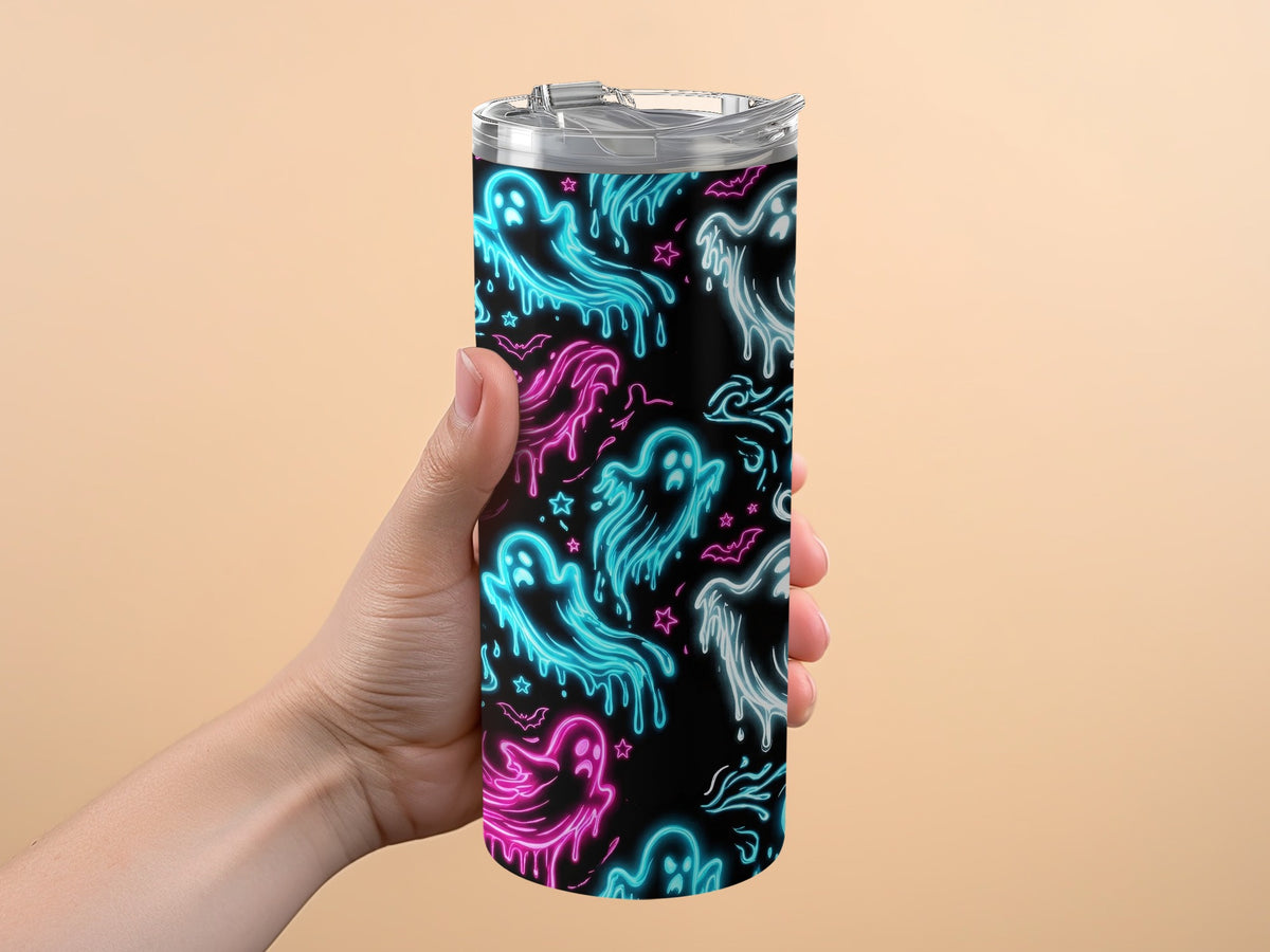 Black tumbler with neon ghost, bat, and star pattern in pink and blue.