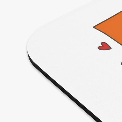 White mousepad with orange fox face and red heart design.