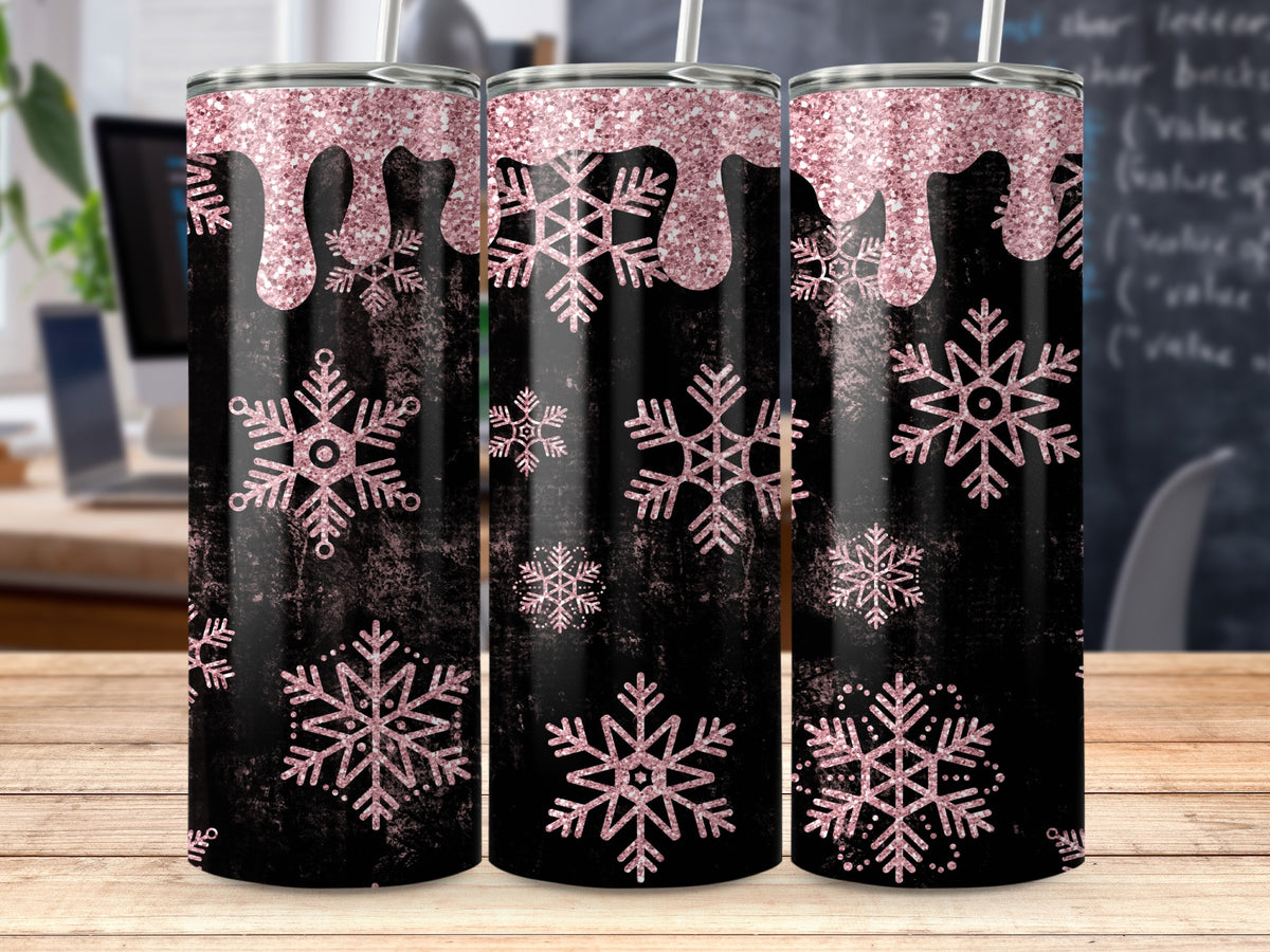 Black tumbler with pink glitter drips and snowflakes design.