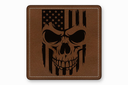 Brown square leather patch with white stitched borders and a black engraved American flag skull design.