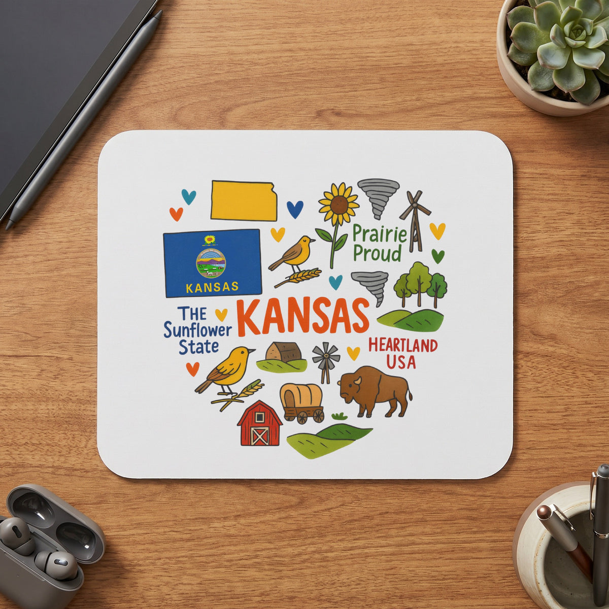 Heart-shaped mousepad with Kansas icons and text, including the state flag and "Prairie Proud."