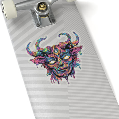 Colorful abstract bull's head sticker on a skateboard deck with silver trucks.