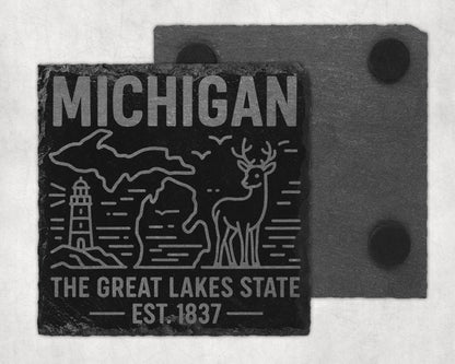 Slate coaster with Michigan outline, lighthouse, deer, and text.
