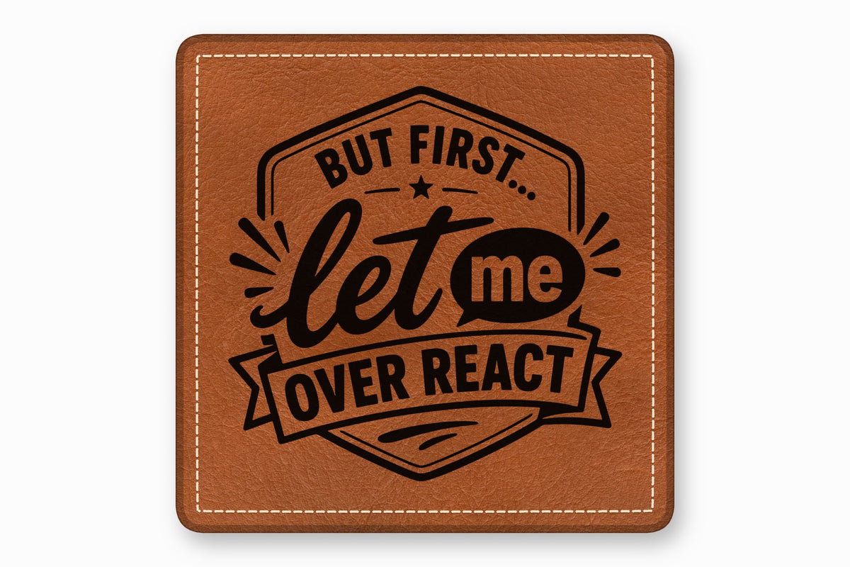 Brown square leatherette patch engraved with black text saying, "But first... let me over react."