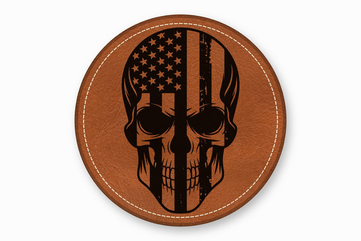 Round brown leather patch featuring a black laser-engraved skull with an American flag design.