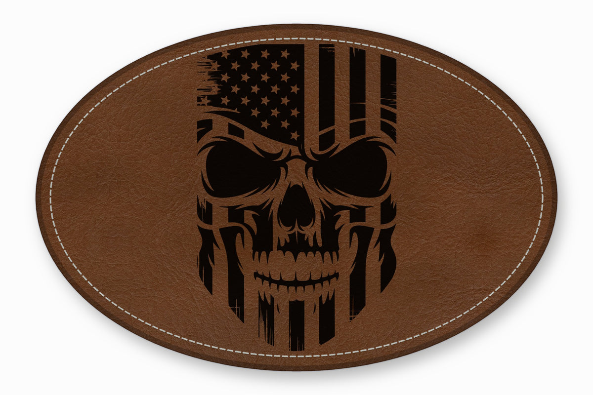 An oval brown leather patch with a stitched border features a distressed American flag skull graphic.