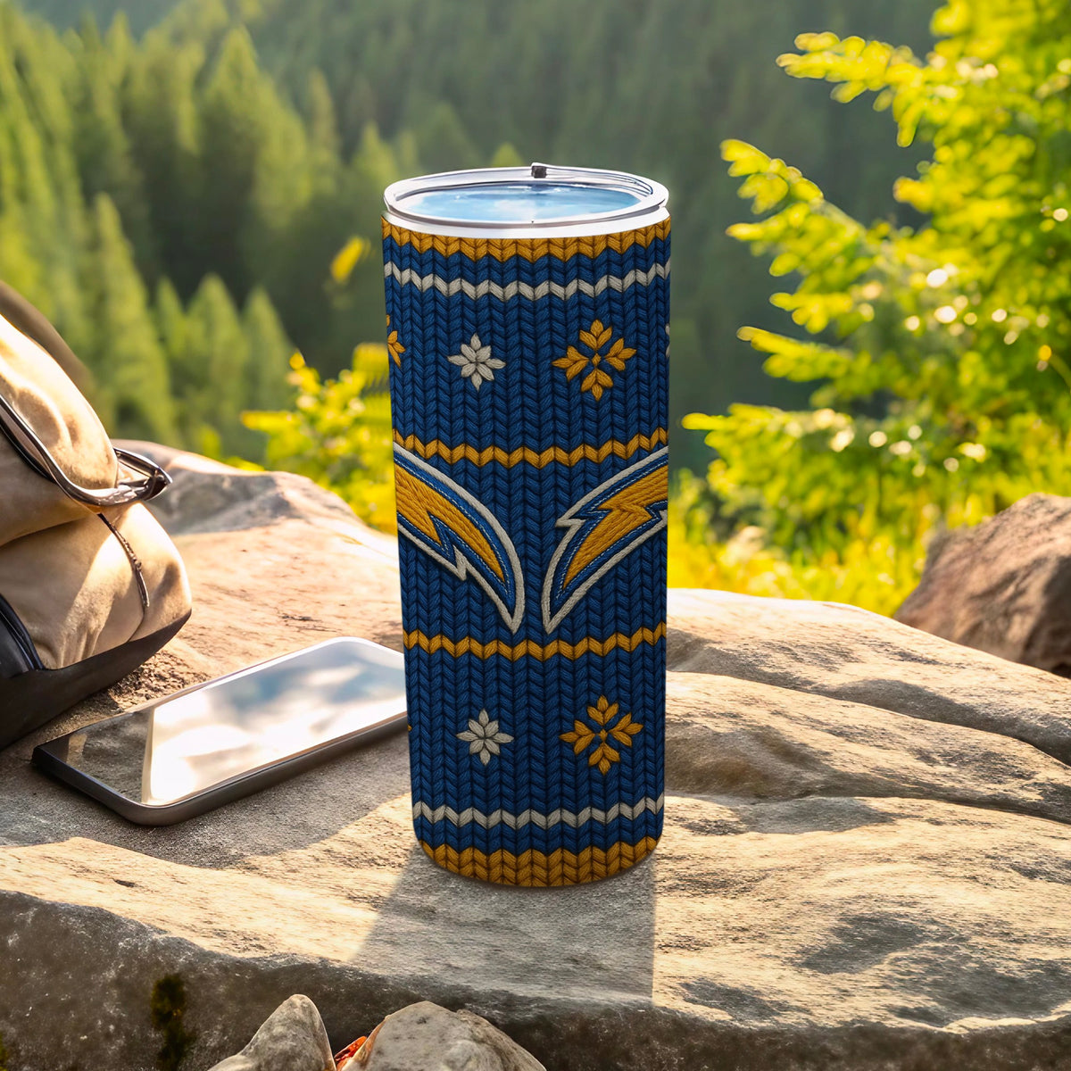 Blue tumbler with a knitted pattern and Los Angeles Chargers logo.