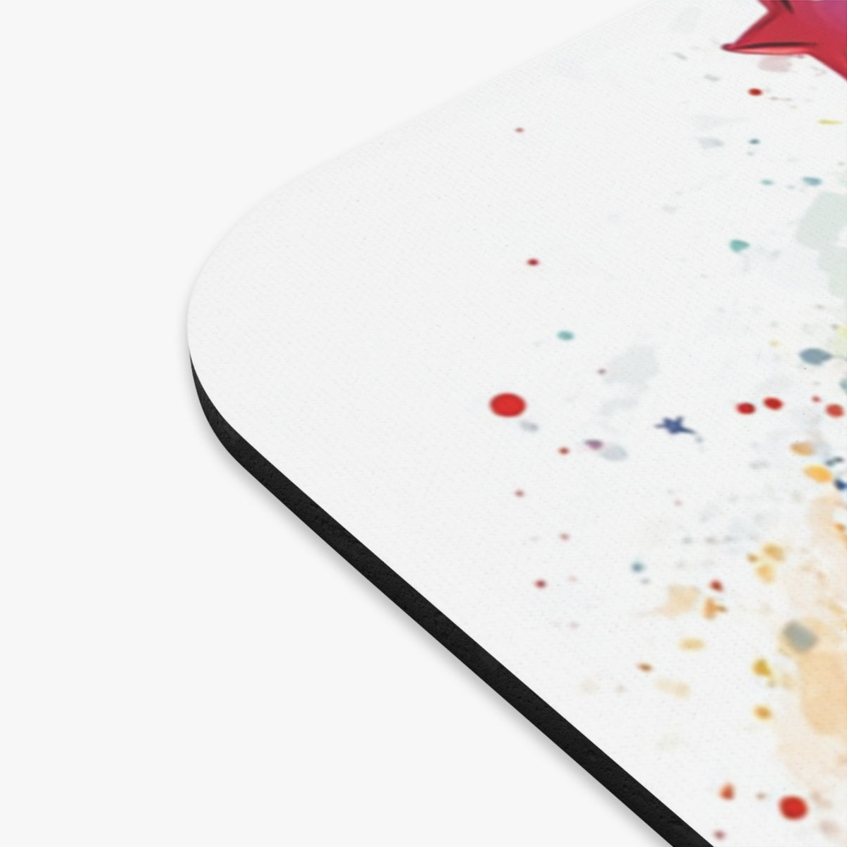 Mousepad with colorful watercolor splatters and a red star element.