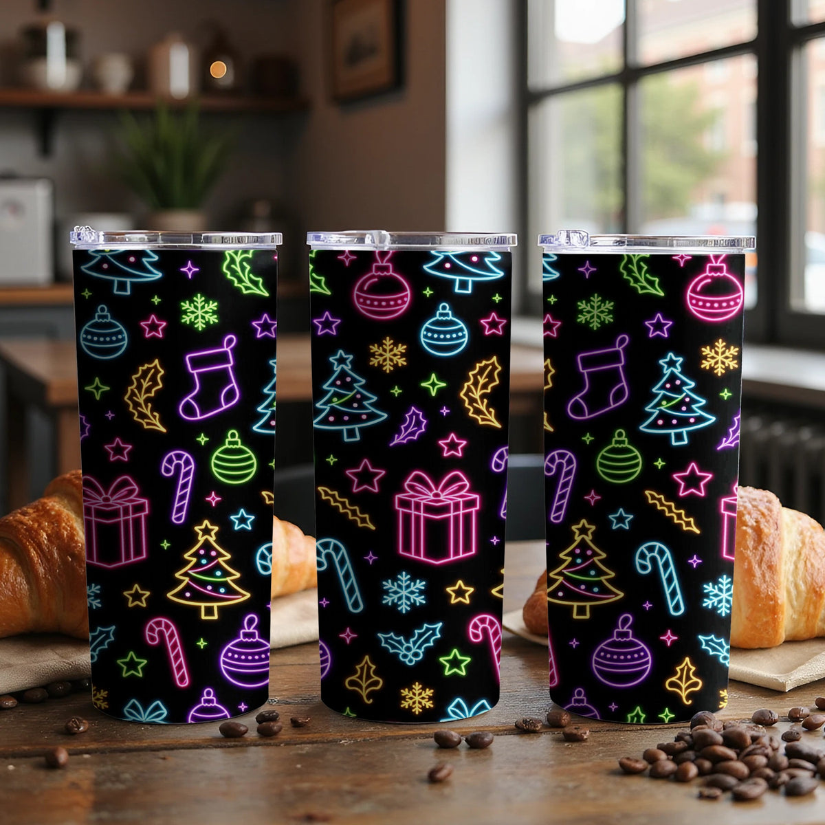 Three tumblers with colorful neon Christmas icons on a black background.