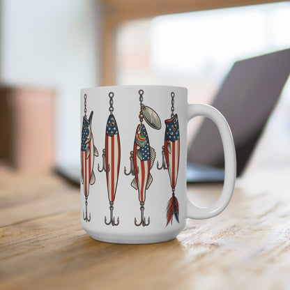 White mug with patriotic fishing lure illustrations on a wooden surface.