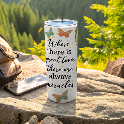 White tumbler with butterflies and the quote "Where there is great love, there are always miracles."