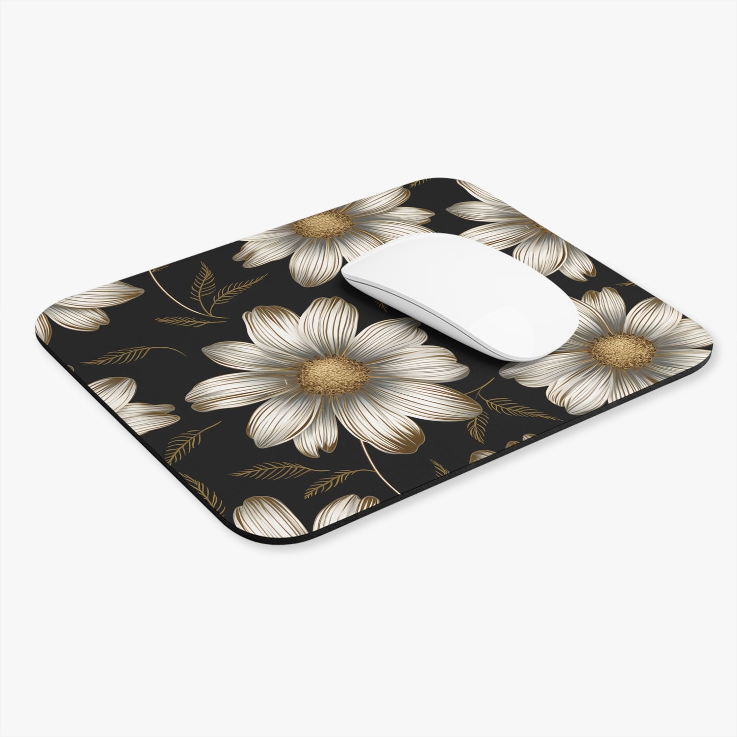 Black mousepad with a repeating floral pattern of white and gold flowers and leaves.