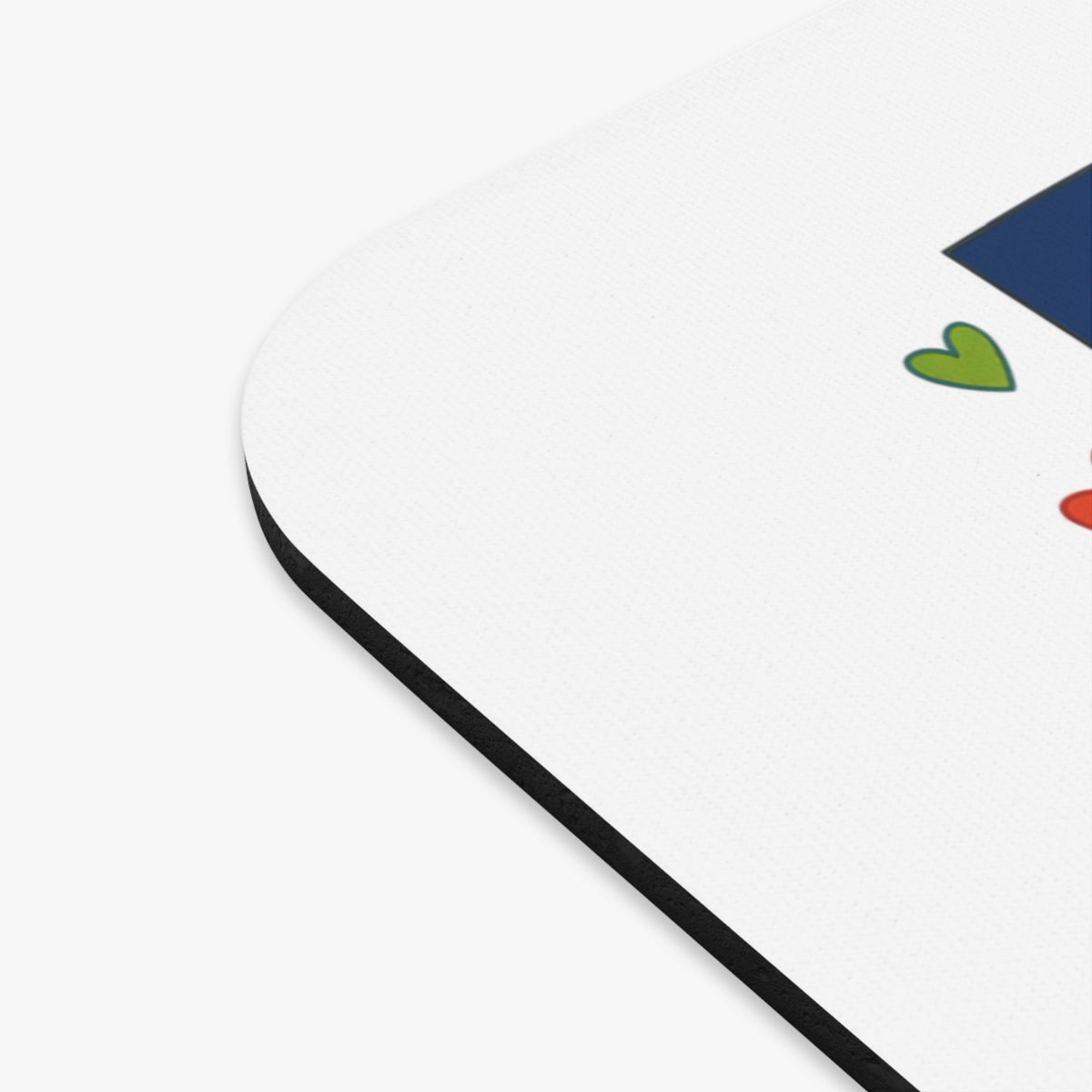 Mousepad with a blue rectangle and green and red hearts.