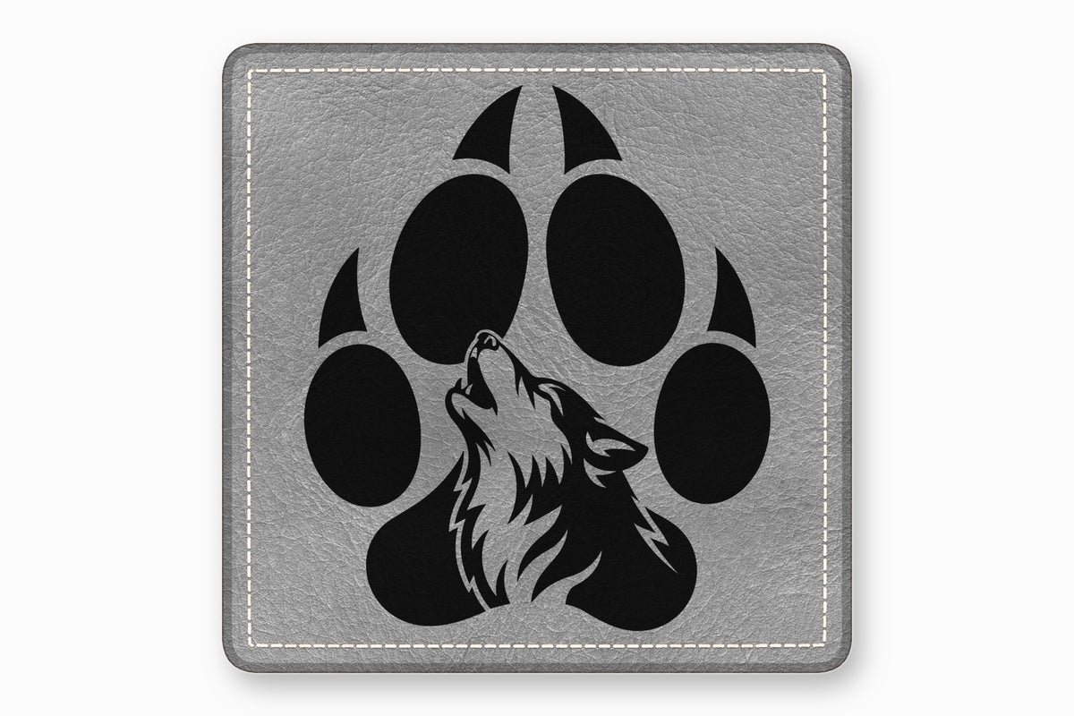Square grey leatherette patch featuring a black paw print with a howling wolf design.