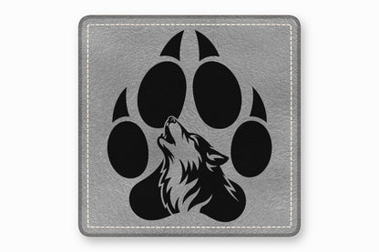 Square grey leatherette patch featuring a black paw print with a howling wolf design.