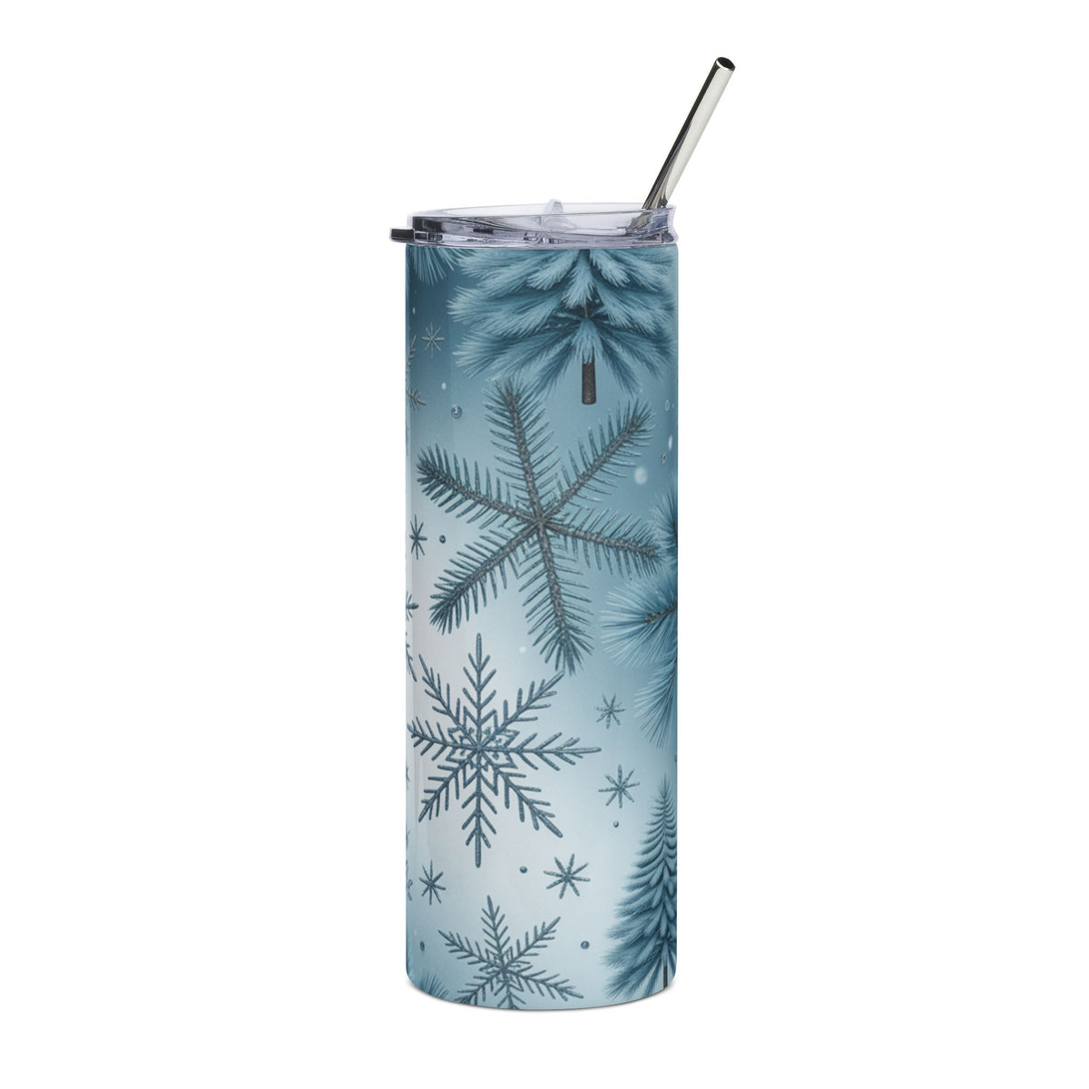Blue tumbler with white snowflakes and pine tree pattern and metal straw.