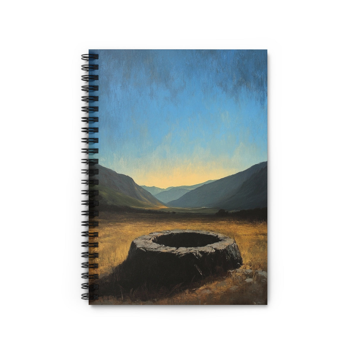 Spiral-bound notebook with a painting of a well in a valley.