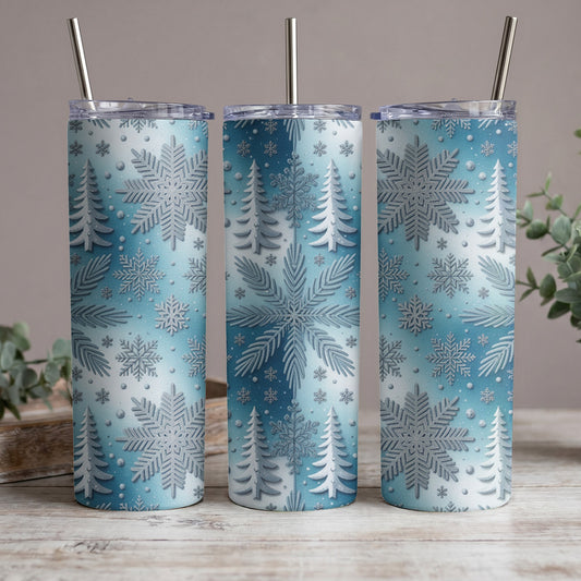 Three tumblers with a blue and white snowflake and pine tree pattern.