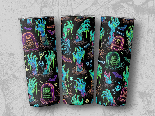 Three tumblers with a Halloween zombie hand graveyard pattern and text.