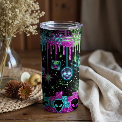 Tumbler with neon dripping barbed wire, alien heads, and pixelated skull.
