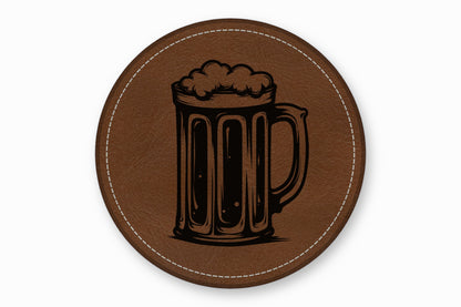 A round brown leather coaster with white stitched edges and a black beer mug graphic.