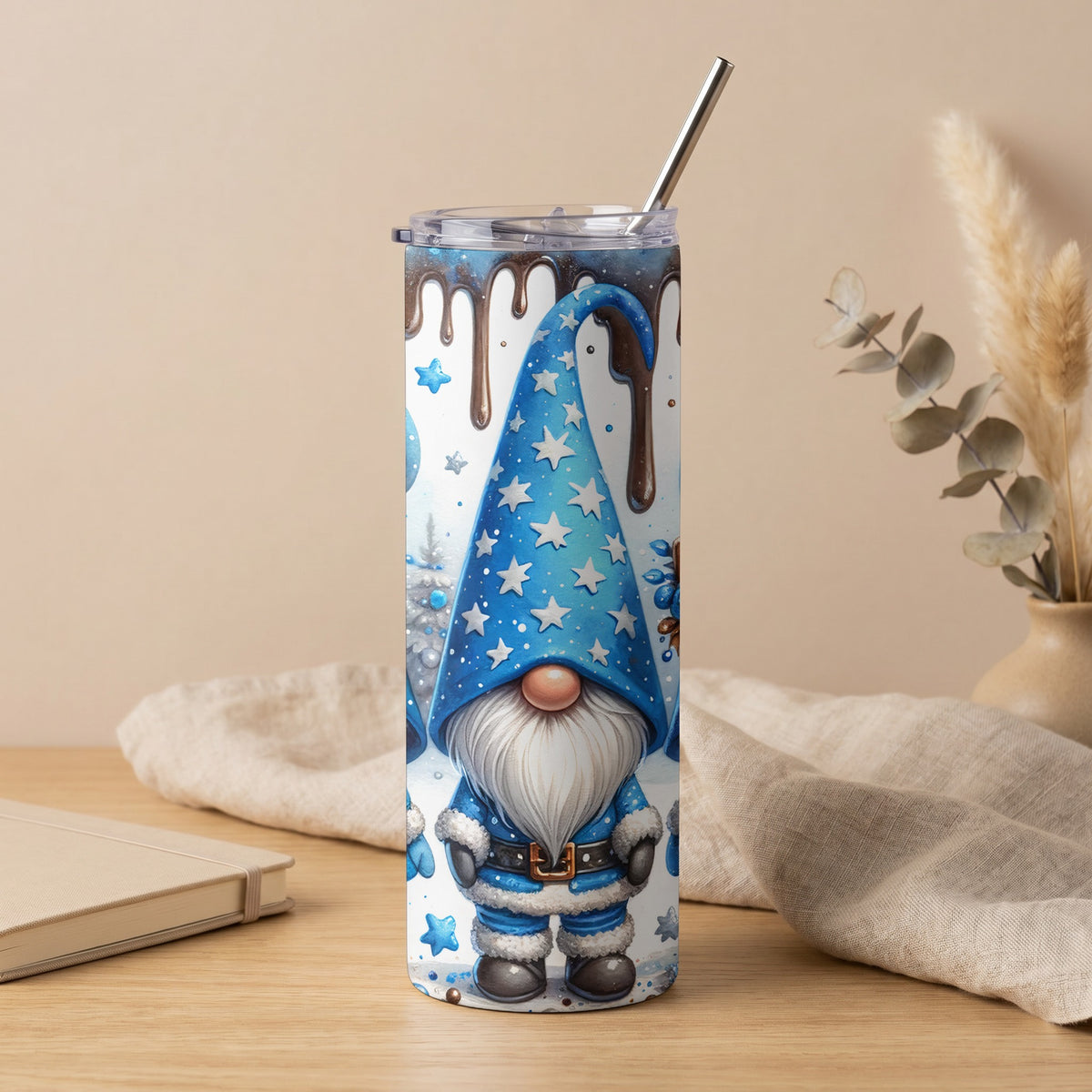 Tumbler with a blue gnome wearing a starry hat and fur-lined suit.