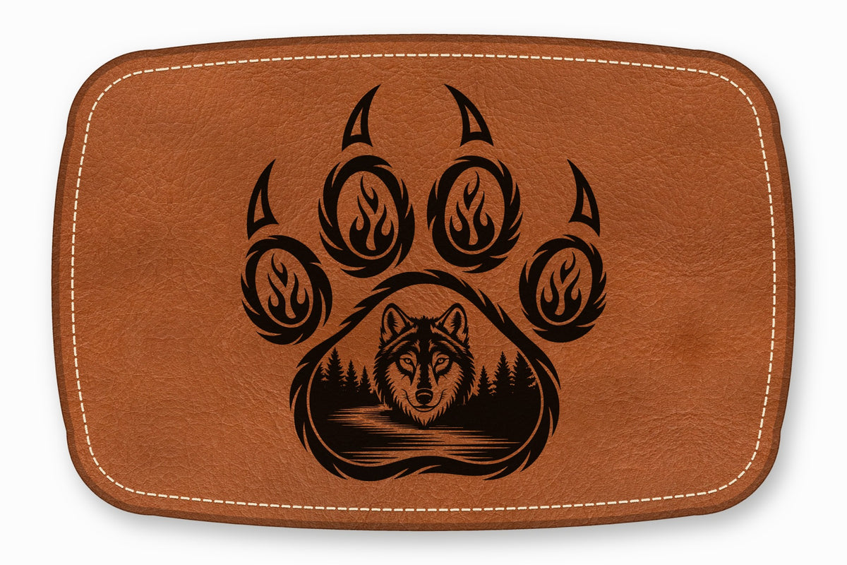 Brown leather patch with white stitching featuring a black bear paw and wolf graphic.