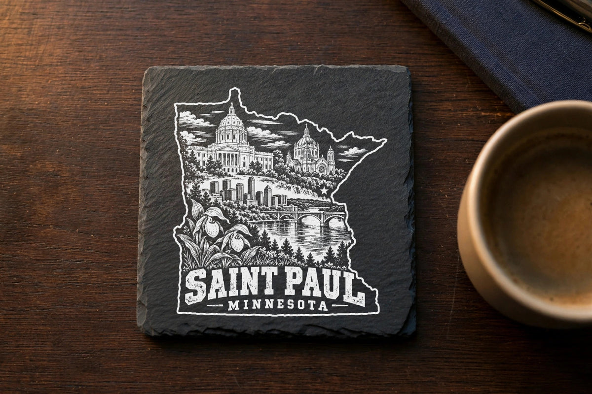 A square slate coaster engraved with a Minnesota map design featuring Saint Paul landmarks and text.