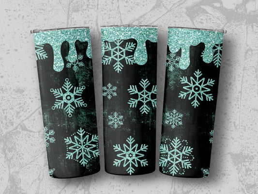 Three tumblers with dripping teal glitter and teal snowflakes on black background.