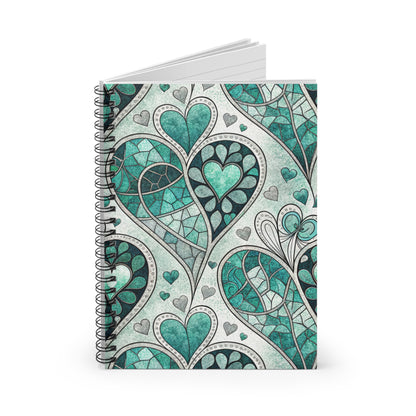 Spiral bound notebook with teal and gray heart stained glass pattern.
