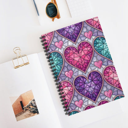 Spiral notebook with stained glass heart pattern in pink, purple, and teal.