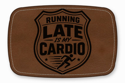 Brown leather patch with rounded corners, white stitching, and a shield graphic featuring the text Running Late Is My Cardio.